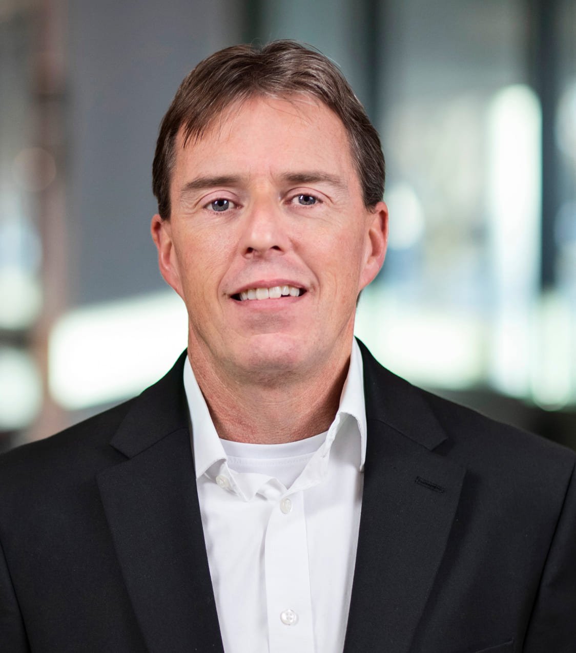 Portrait of Jason Greenfield - Corporate Vice President - Taylor Corporation